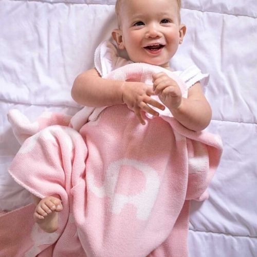 Pink knitted baby outlet blanket